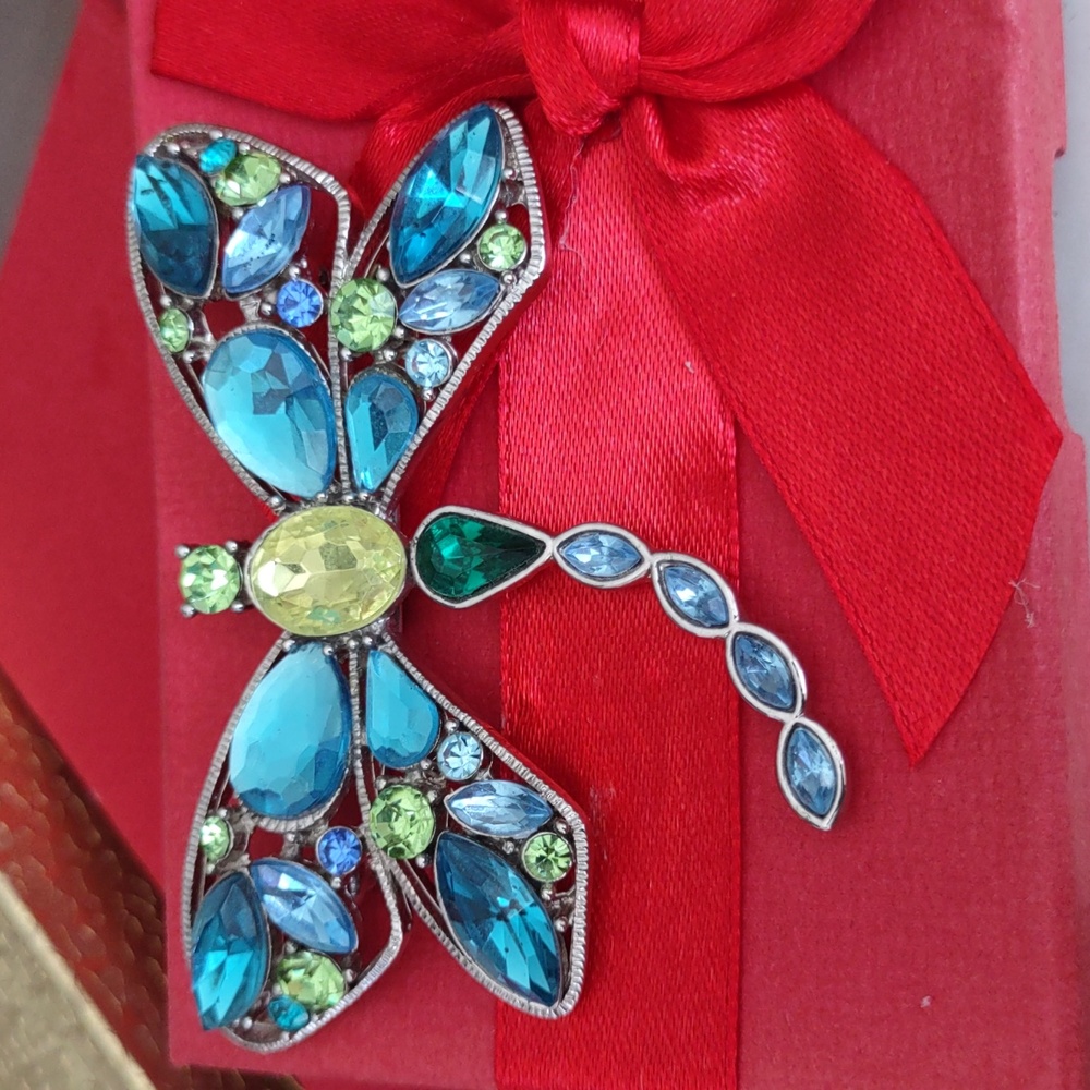 A beautiful multi colored cut glass  dragonfly brooch